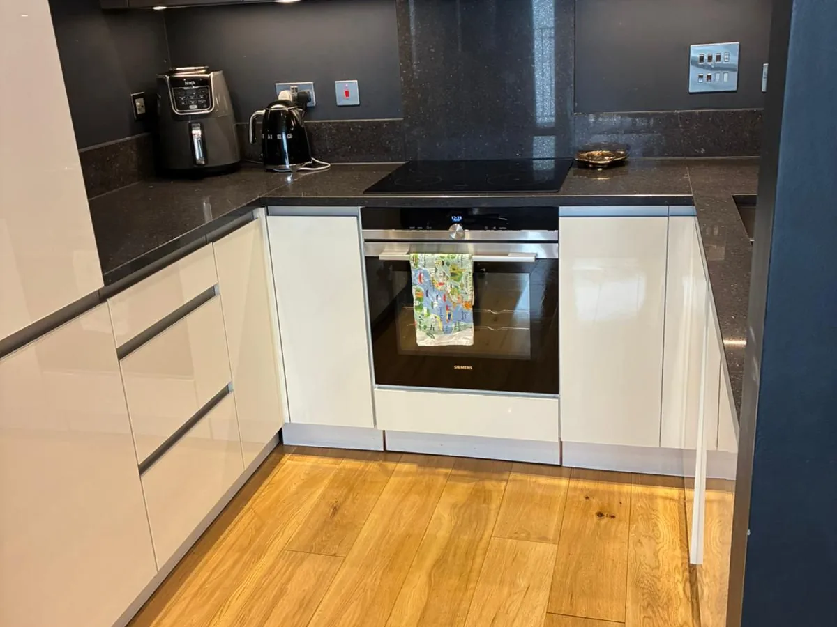 Kitchen worktops and hob cleaned